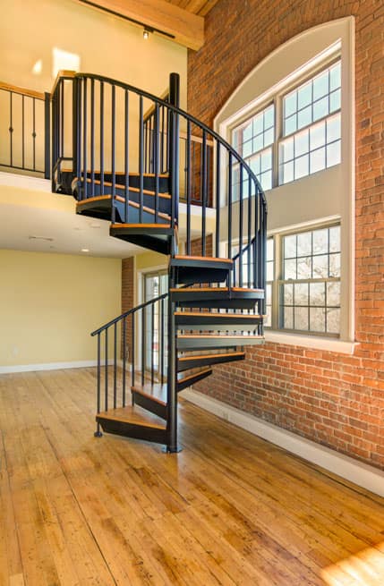 transitional condo steel spiral stair