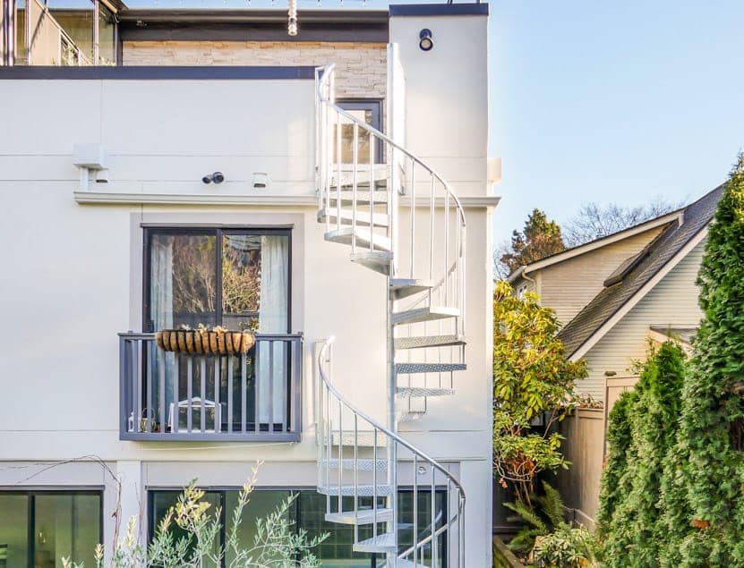 modern multistory deck with galvanized spiral stair