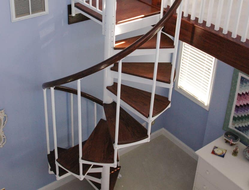 painted steel spiral stair with wood accents