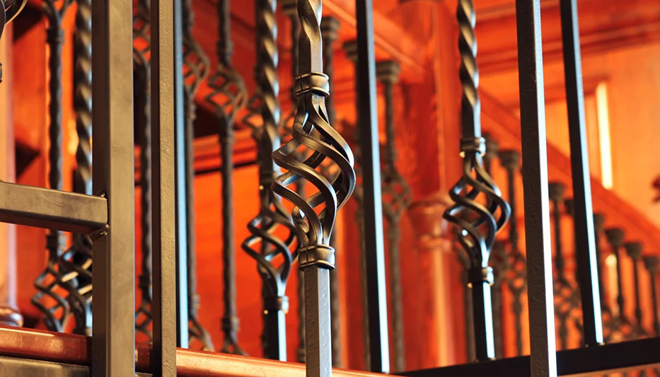 twisted cage balusters forged iron spiral stair