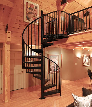 steel spiral staircase in timberframe cabin