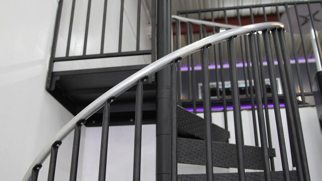 commercial garage spiral stair handrail detail shot