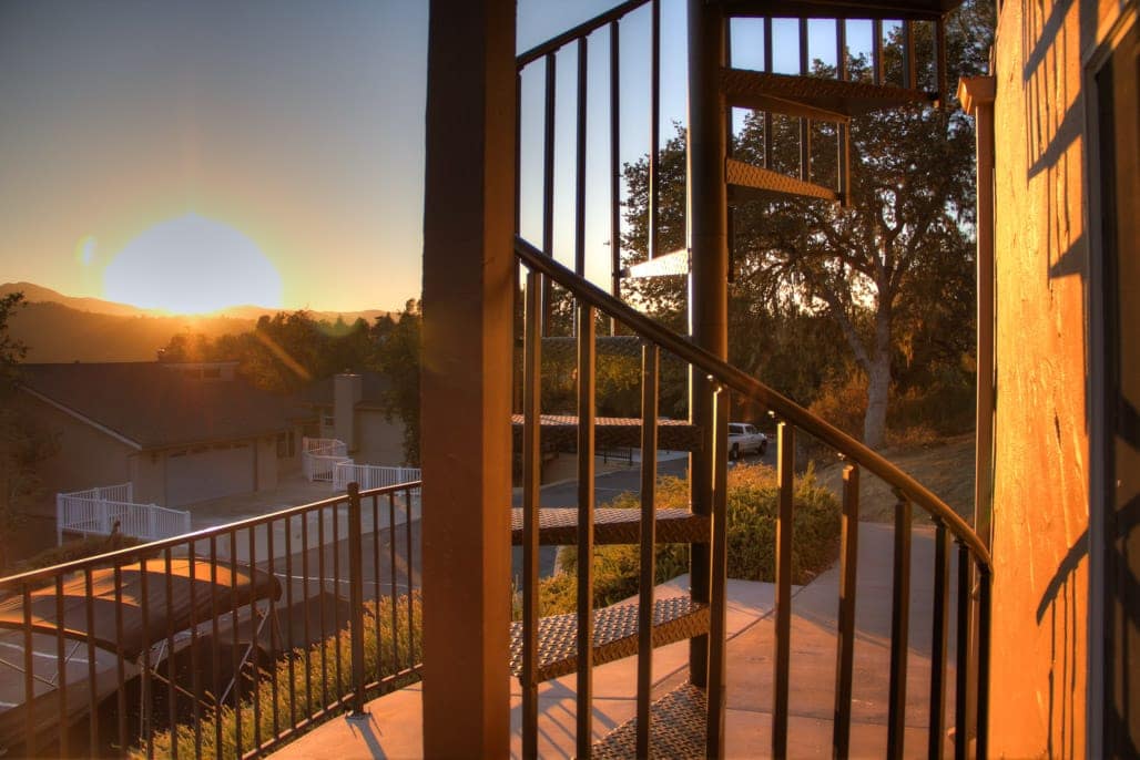 aluminum spindles on outdoor spiral stair