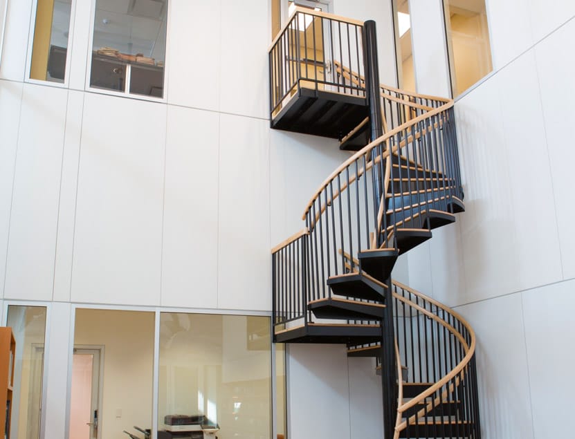 The Allenby (Indoor Steel Landing Commercial Spiral Stairs)