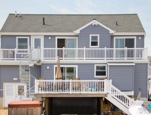 beach house with multi level deck