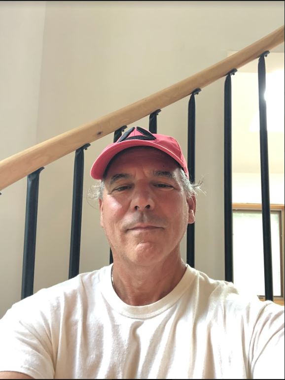 client on indoor spiral staircase