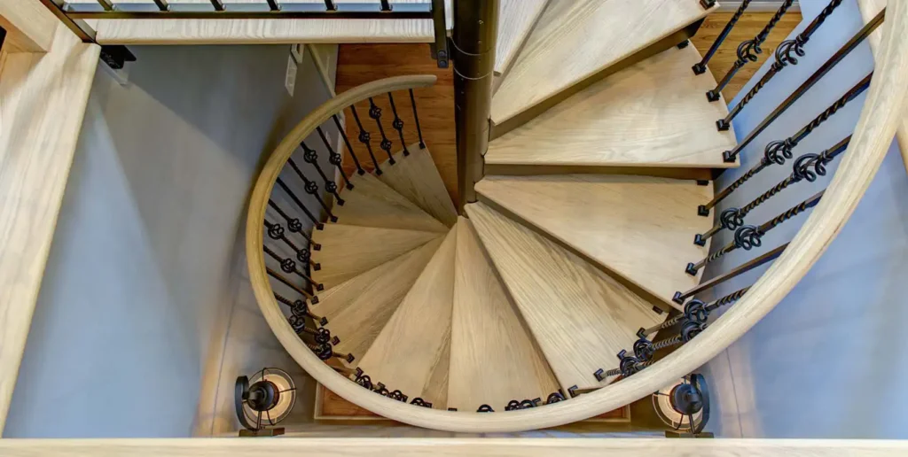 Top-down view of a spiral staircase illustrating common design and layout questions