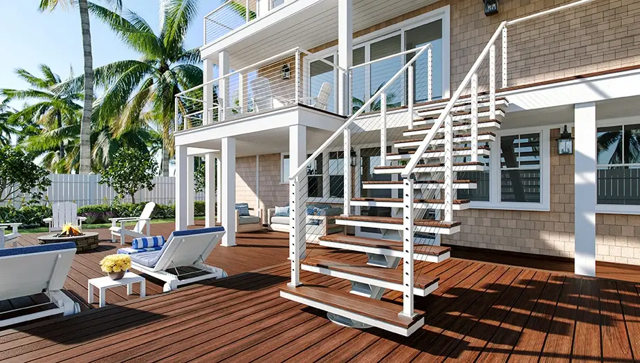 The Winchester outdoor floating staircase featuring a white powder-coated aluminum stringer and railing, cable rail infill, and composite tread covers that match the surrounding deck.